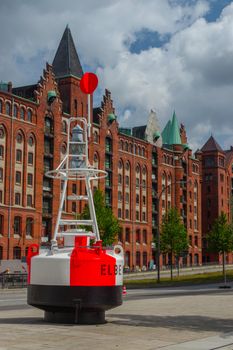 HAMBURG, GERMANY - JULY 18.2016: Famous Speicherstadt warehouse district with a buoy