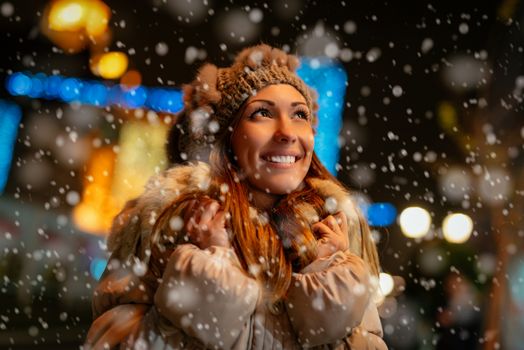 woman winter snowflakes happy snow pensive