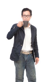 portrait of young asian man drinking hot drink in coffee mug cup