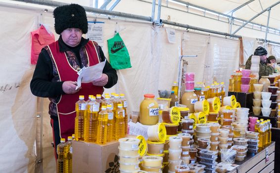 Moscow, 4 December 2016 honey trader in a Cossack hat