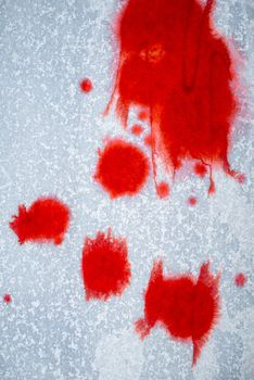Blood stains on white paper