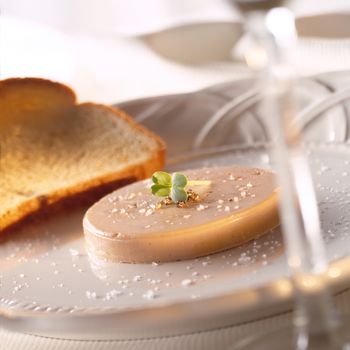 Fois gras de canard on a plate with bread