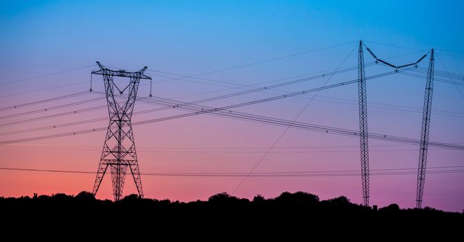 Electricity Pylons at Sunset