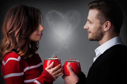 Couple with coffee and heart shaped steam