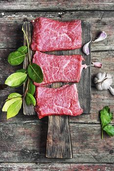 Raw meat steak and seasoning