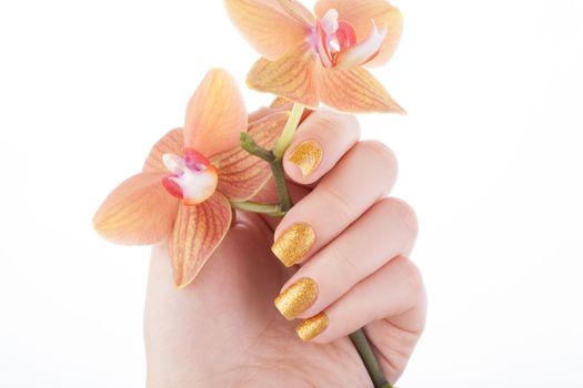 Beautiful golden manicure.