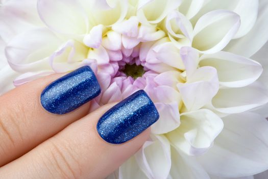 Blue nail polish.