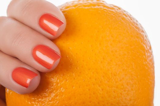 Orange nail polish.
