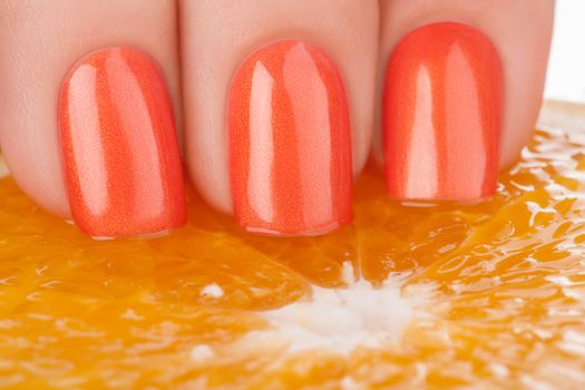 Orange nail polish.