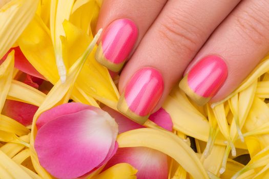 Pink nail polish.