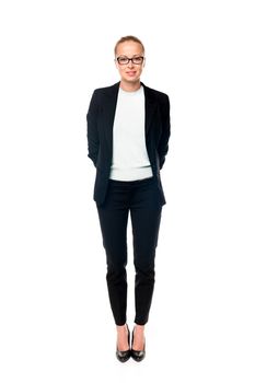Business woman standing with arms crossed against white background..