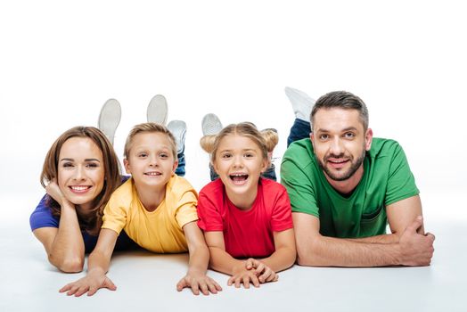 Happy family in colored t-shirt
