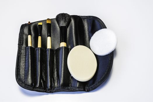 Cosmetic Tools and products on a white background