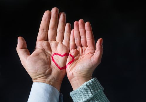 Hands with heart symbol