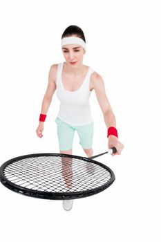 Female athlete playing badminton 