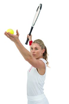 Athlete holding a tennis racquet ready to serve 