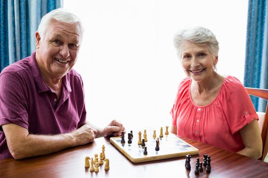 Senior couple playing chess