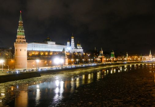 The Kremlin and the Moscow river at night in winter