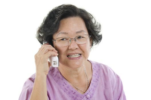 Senior adult woman on the phone