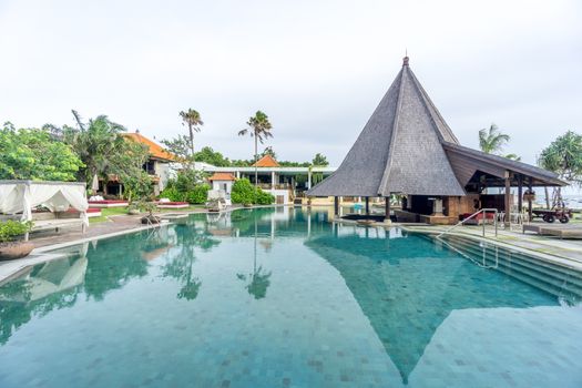Bali, Indonesia - December 24, 2016: Swimming pool of luxury hotel at bali, indonesia
