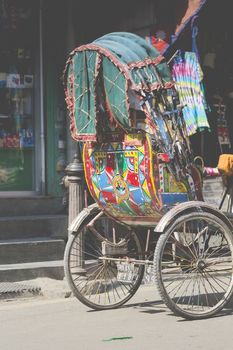 Wheeled rickshaws waiting for customers in Kathmandu