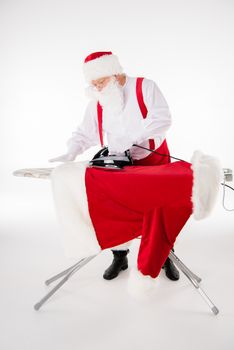 Santa Claus ironing coat