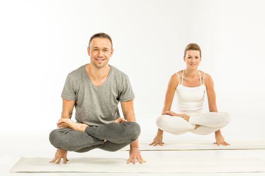 Couple sitting in yoga position