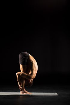 Man standing in yoga position