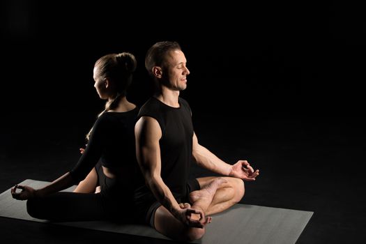 Man and woman meditating