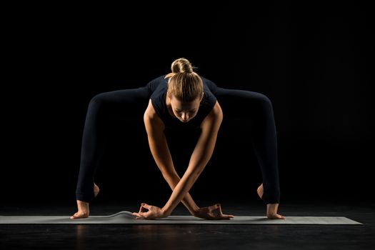 Woman standing in yoga position     