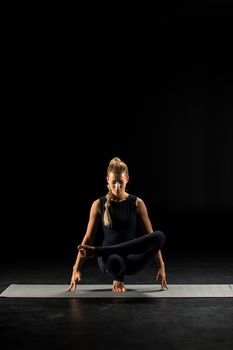 Woman standing in yoga position       