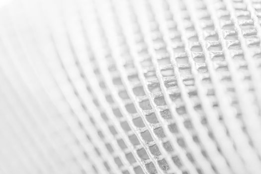 Abstract white background of grunged grid metal