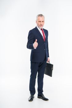 Businessman showing thumb up 