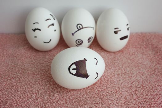 Eggs are funny with faces. Concept of a funny joke