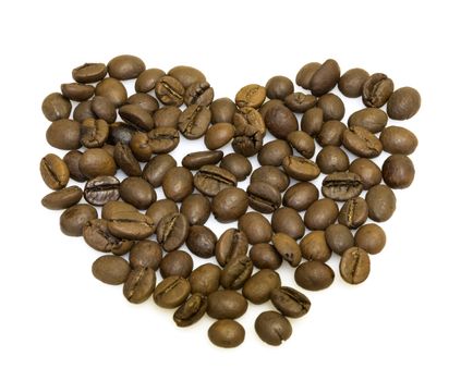 heart from coffee beans isolated on a white background.
