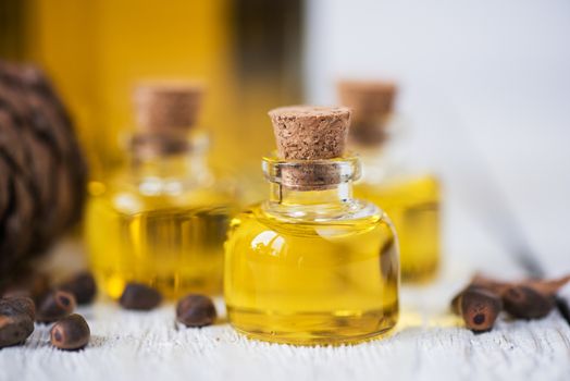 The cedar oil in a glass bottle