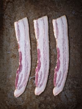 rustic uncooked bacon