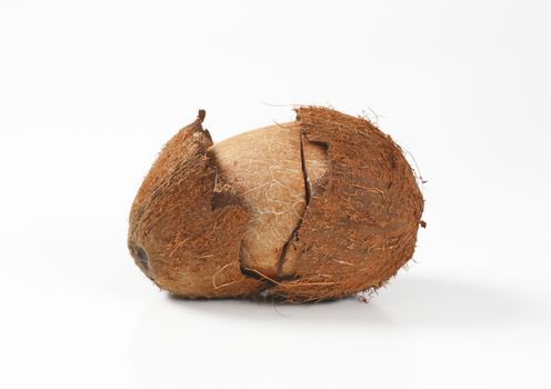 fresh coconut with cracked husk