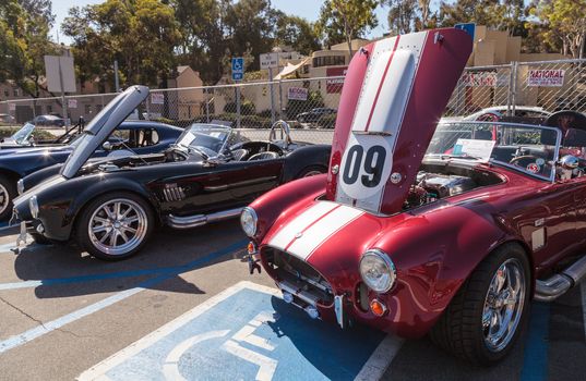 Red and white 1965 Shelby Cobra