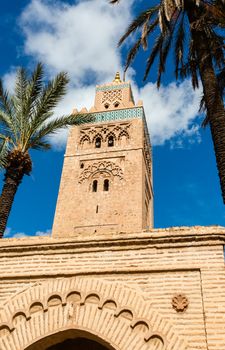 Koutoubia minaret made from golden bricks in centrum of media, M