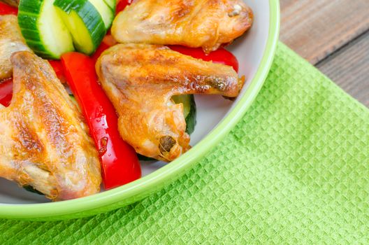 Chicken wings baked with vegetable and garlic