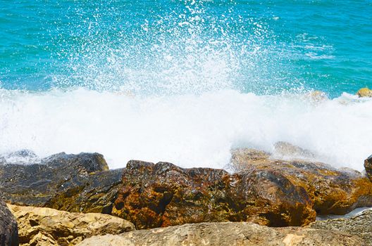 Sea waves break about stones northern Israel