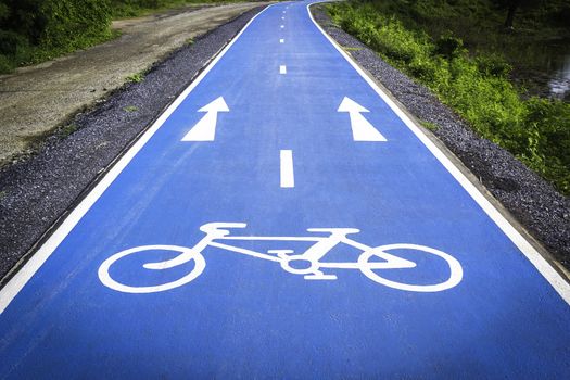 Blue bicycle symbol lane 