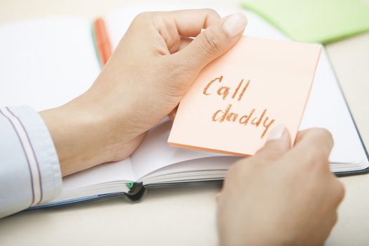 Call daddy text on adhesive note
