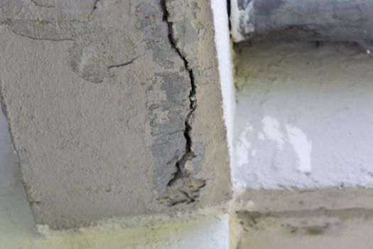Small cracks in the plaster on the outside wall