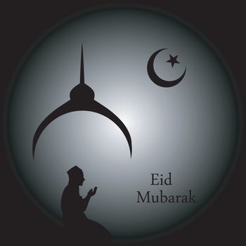 Man praying under the moon- card for eid