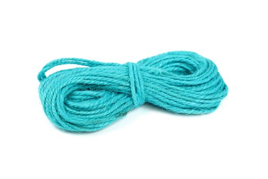 Blue jute twine coil skein isolated on white