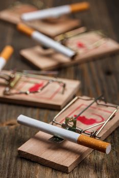 Cigarette in mousetrap