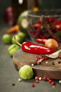 Hot red pepper and ingredients for cooking