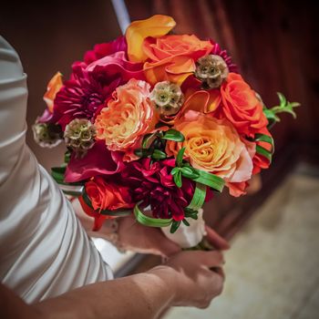 Colorful Bouquet Held by Bride